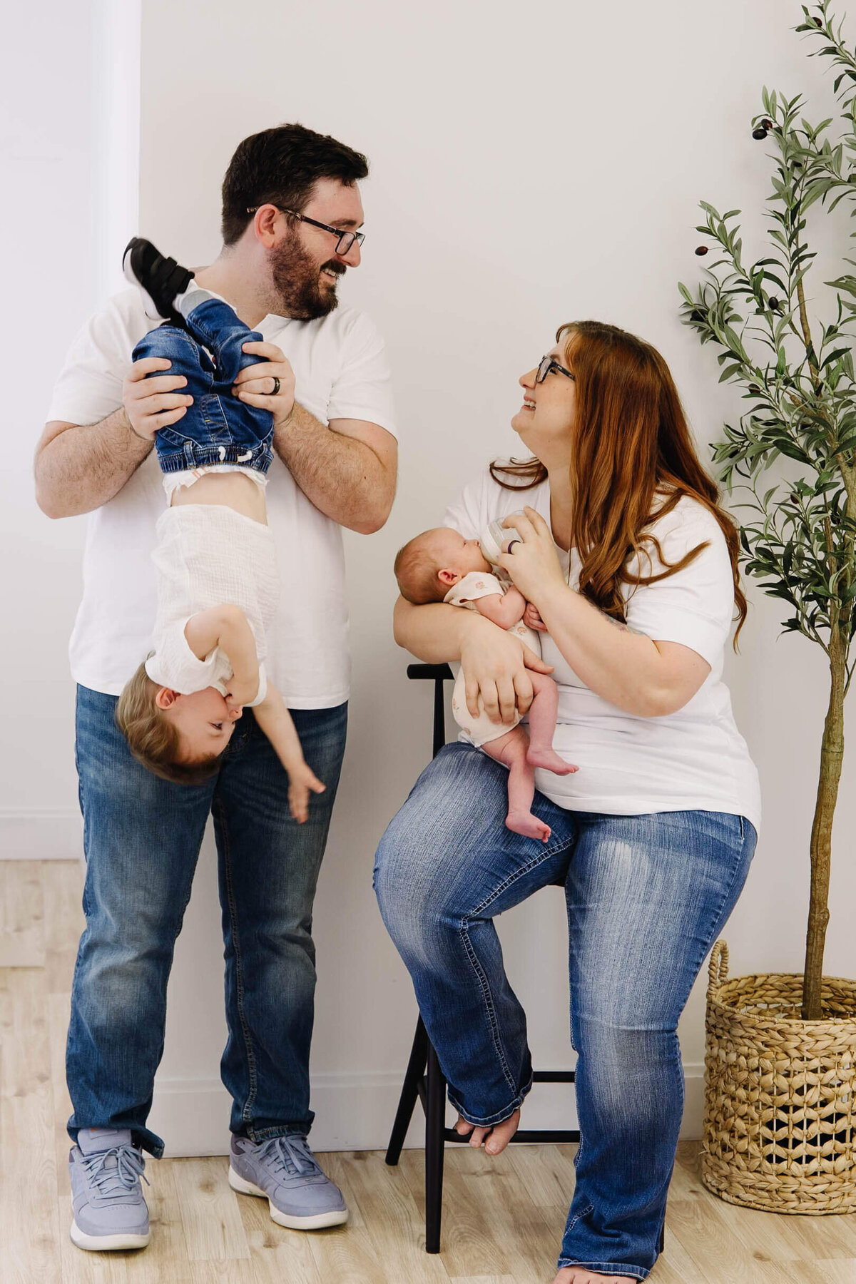family photo in studio with matching outfits
