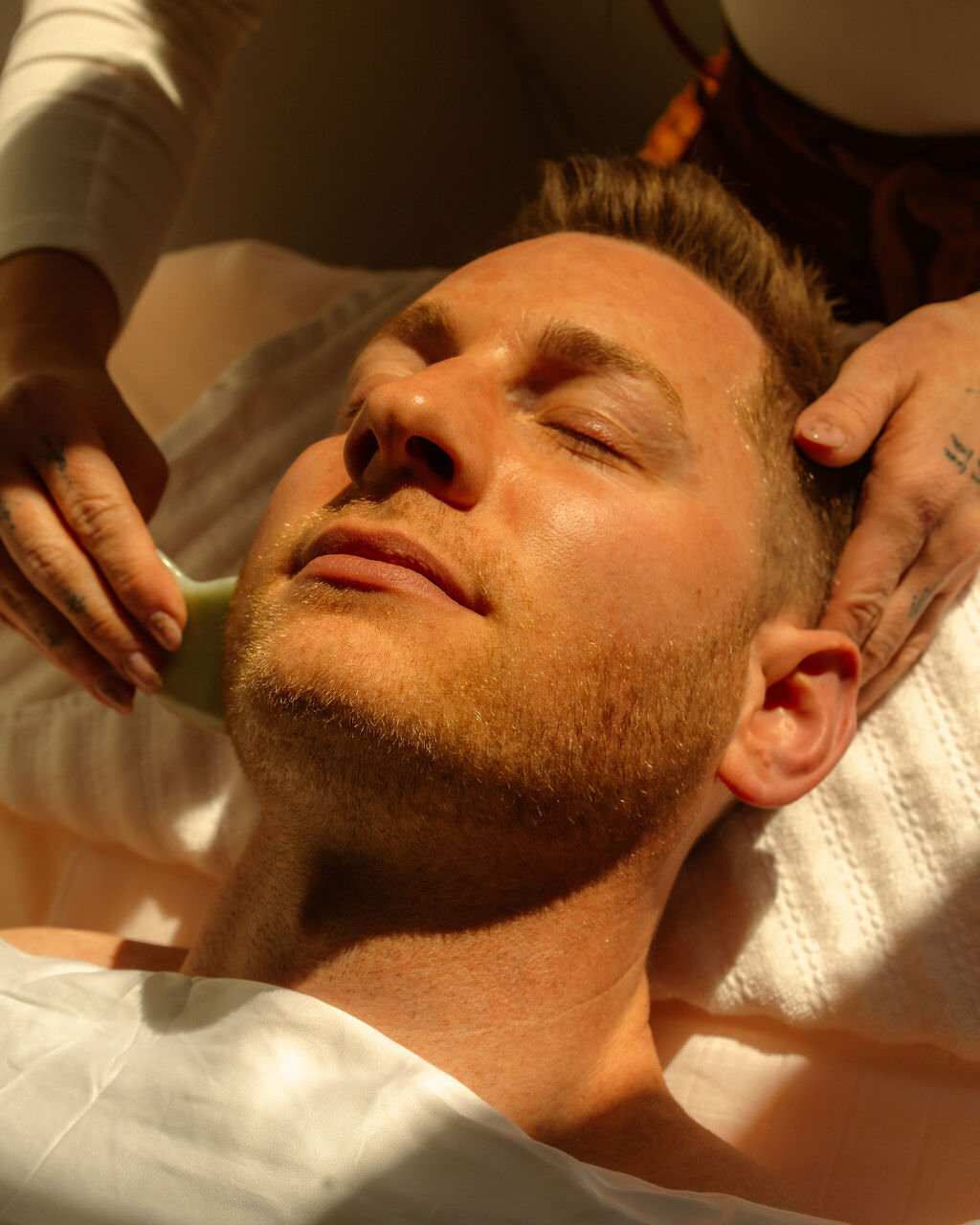 Clean, professional medical spa treatment room with neutral tones at Golden Hour Esthetics in Bend