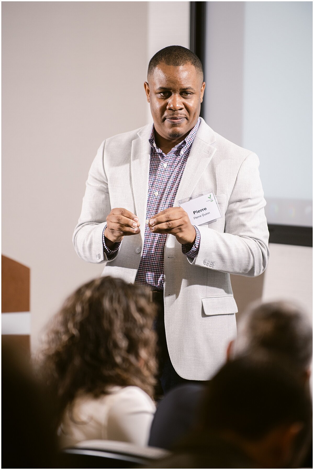 Male speaking to a group