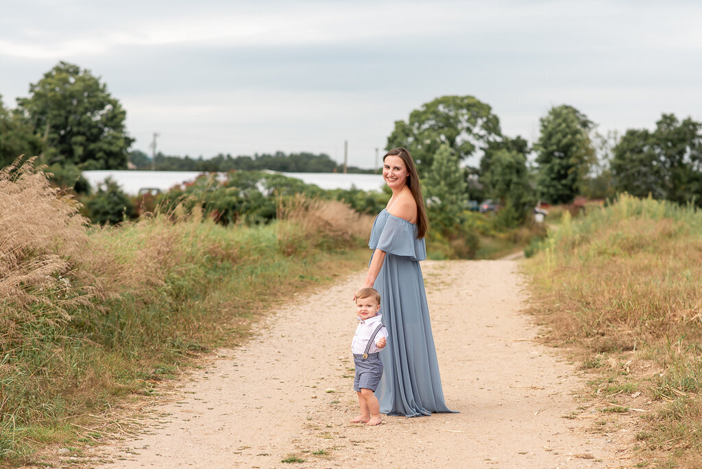 Mother and son walking down dirt path at CT family session |Sharon Leger Photography, Canton, Connecticut | CT Newborn and Family Photographer