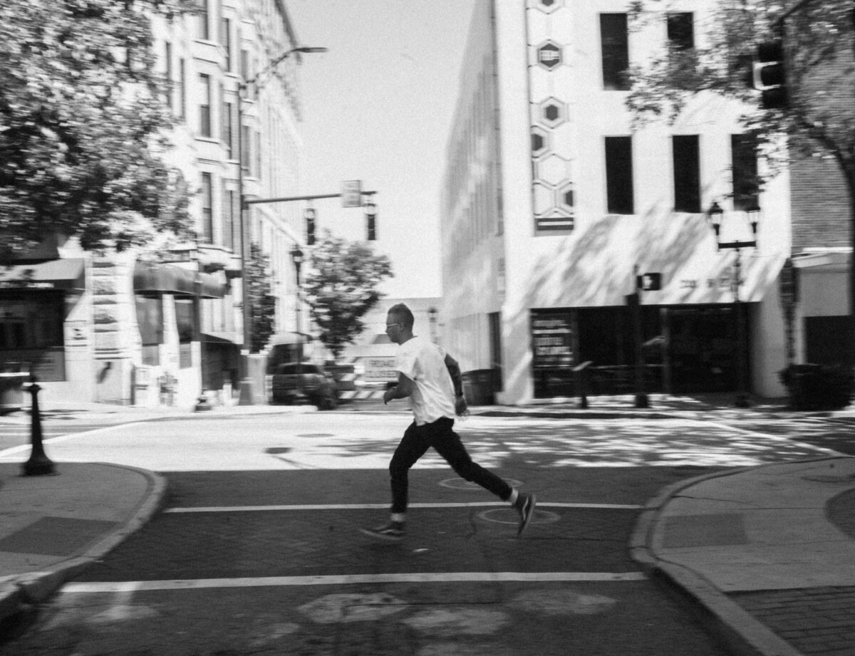 Model running in black and white in Greensboro, NC