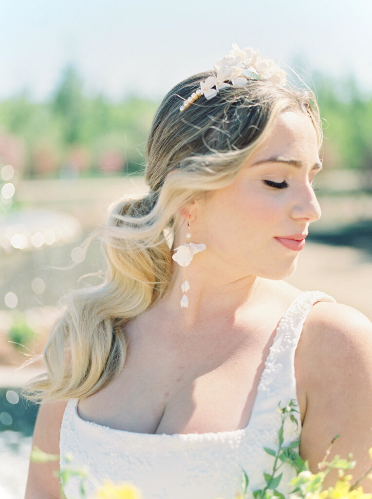 Romantic and elegant bridal hairstyle by Veil Beauty Co, Edmonton hair & makeup artist, featured on the Brontë Bride Vendor Guide.