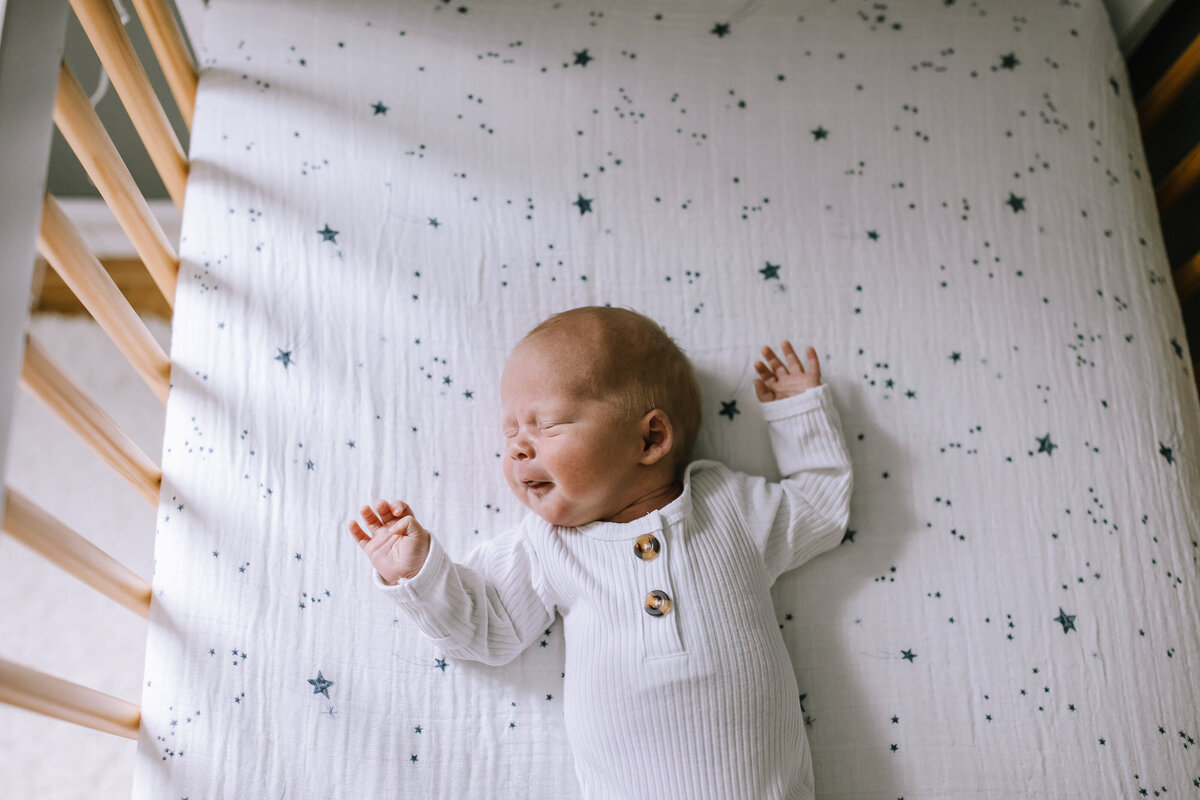 Newborn baby in a crib in PIttsburgh. 