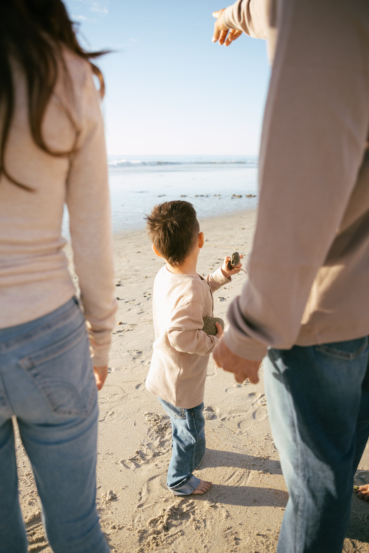 Golden hour family portraits in San Diego beach