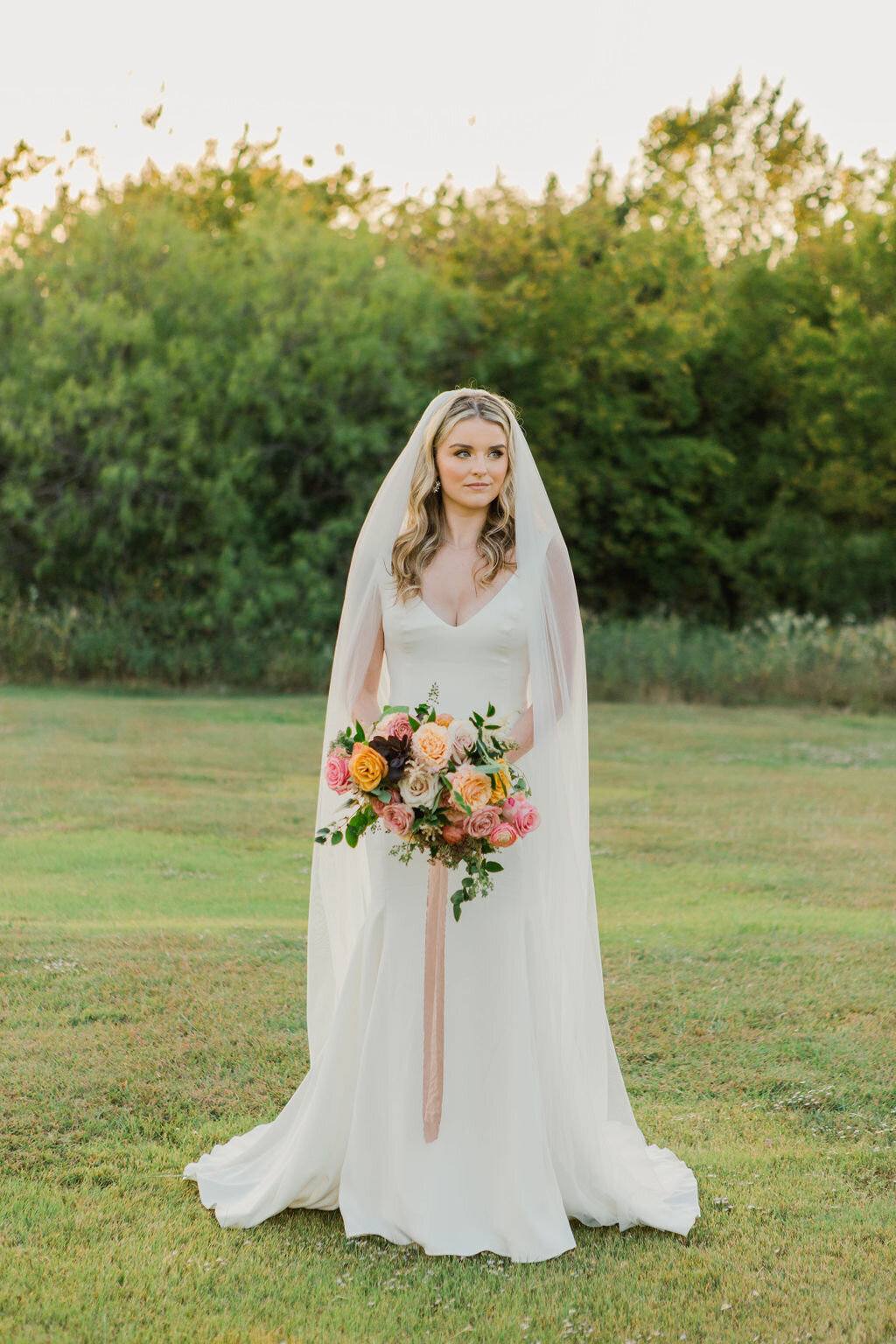 Bride with lush wedding bouquet by Vella Nest Floral Design, Dallas Fort Worth Wedding Florist