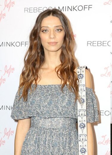 Angela Sarafyan wearing natural makeup and her hair down for a casual event