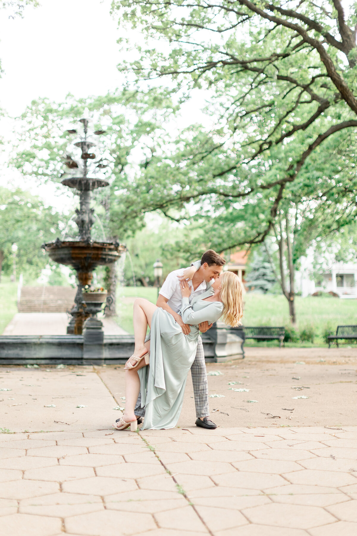 couple in a dip in front of a fountain by wedding photographer in sarasota