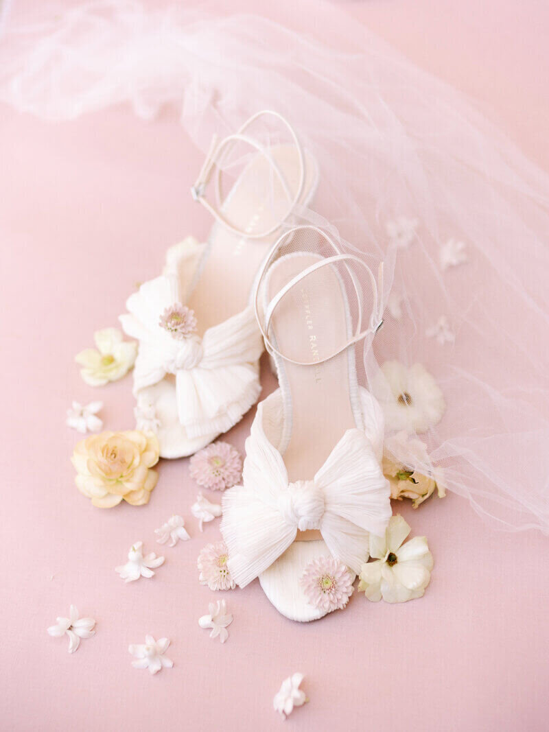 Bridal shoes and flowers by wedding planners in chicago