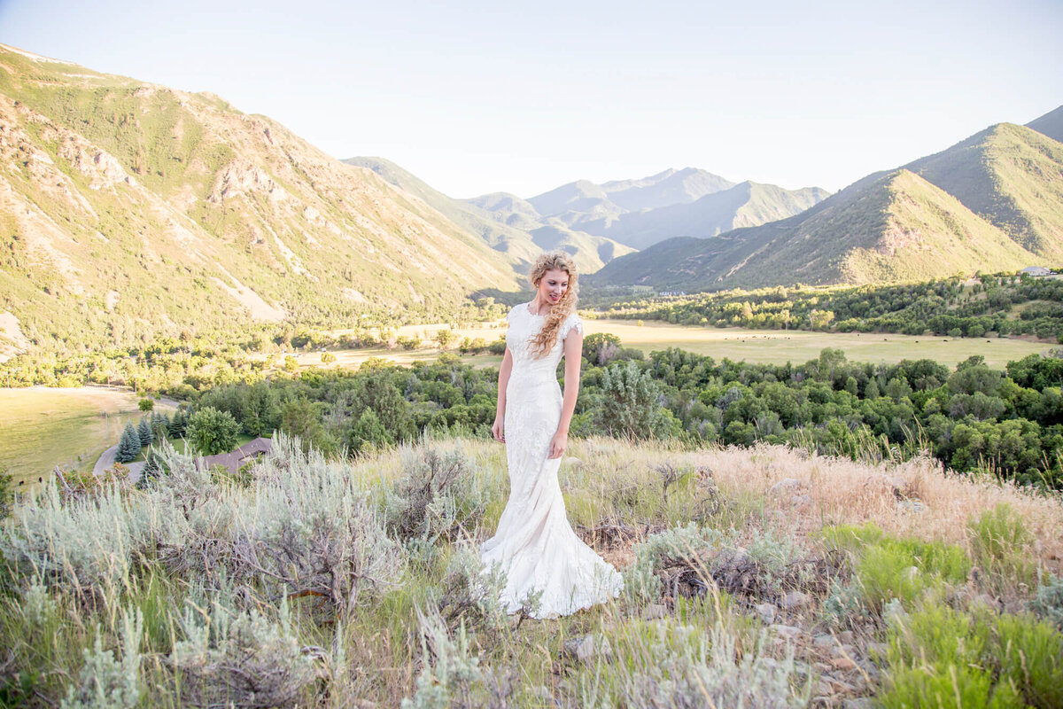 a bride in the mountains. wedding photography captured by Jessica Bowles