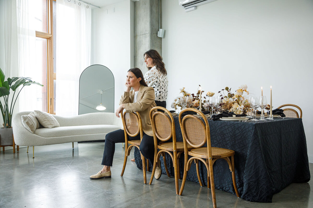 Portland event rentals company founders set a table for a party