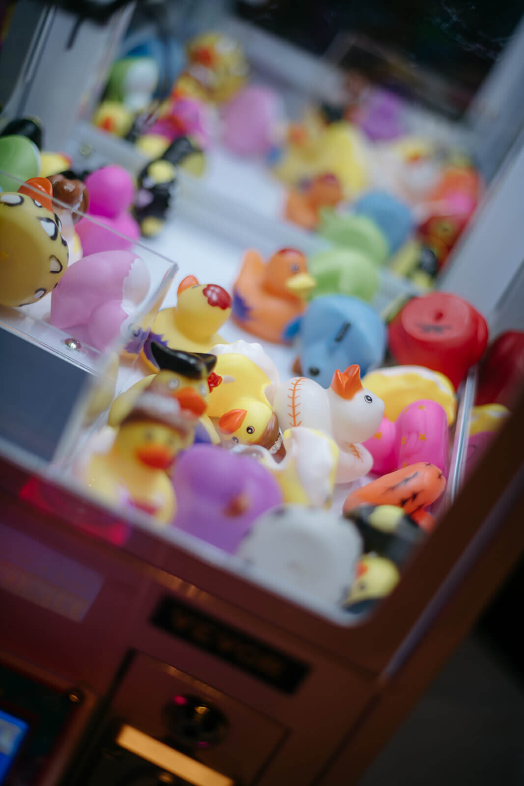 An inside view of the wedding reception mini claw game featured at the St., Regis Aspen wedding reception.