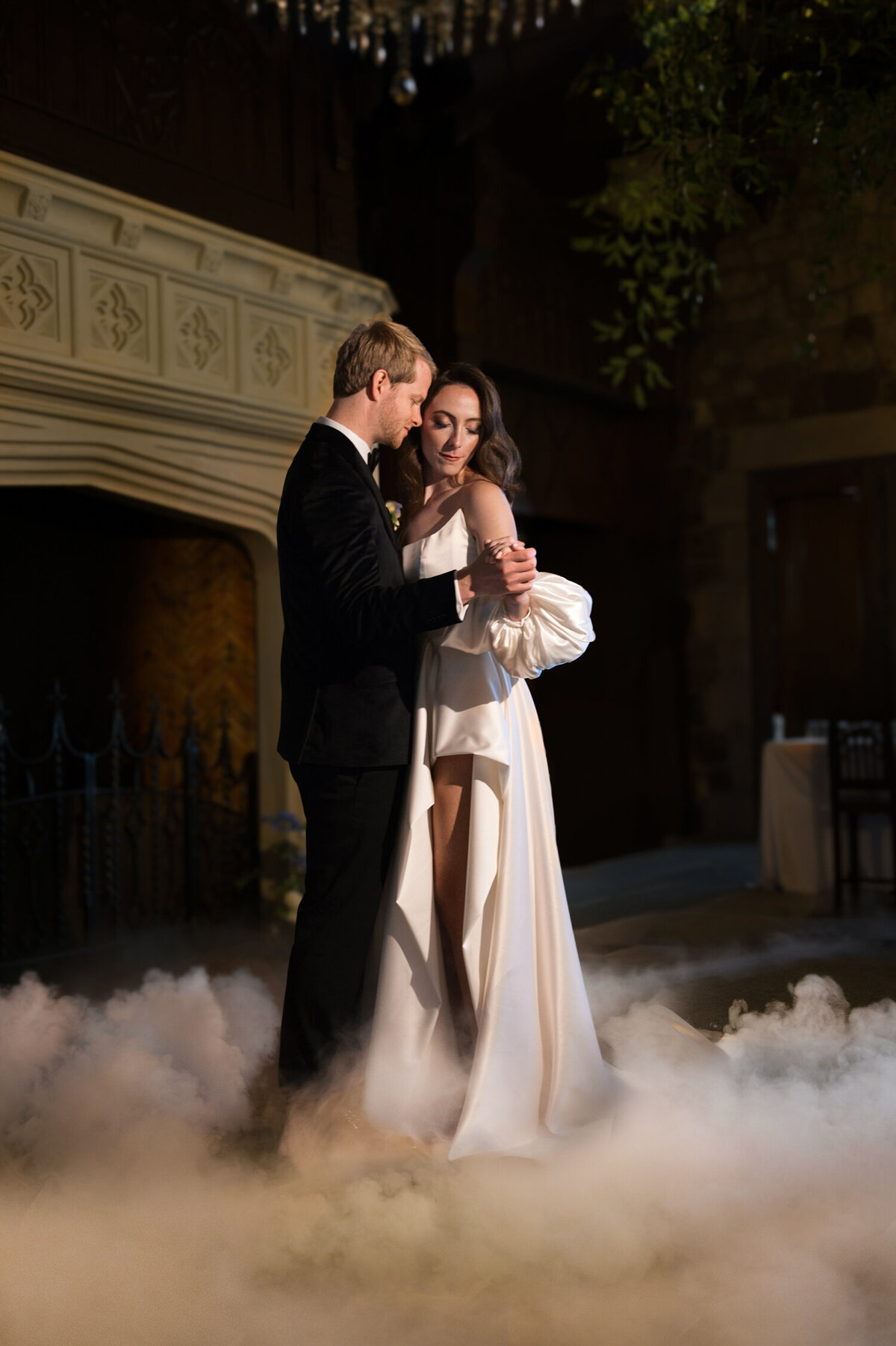 luxury bride and groom doing their first dance with smoke machine at chateau de lis in portland oregon