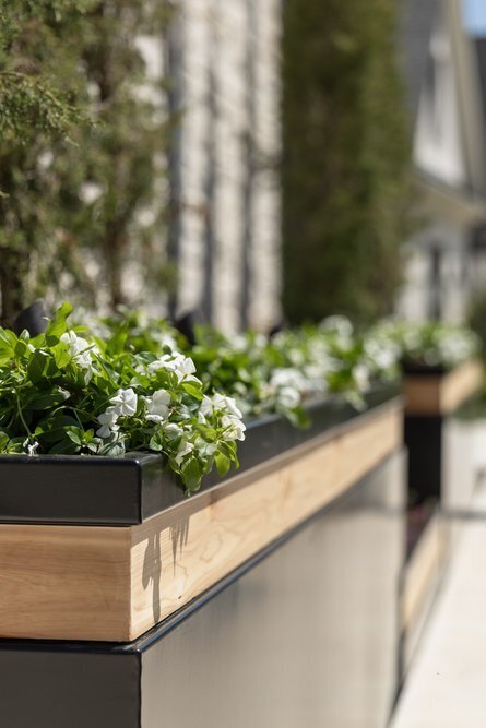 black-metal-planters-seasonal-color-flowers-little-rock-thumbnail