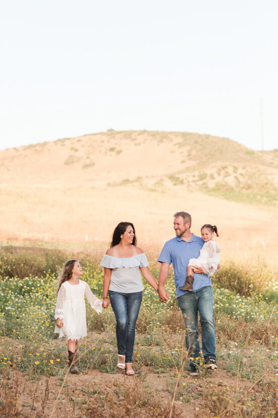 family-walking-in-field-Bonita-San-Diego