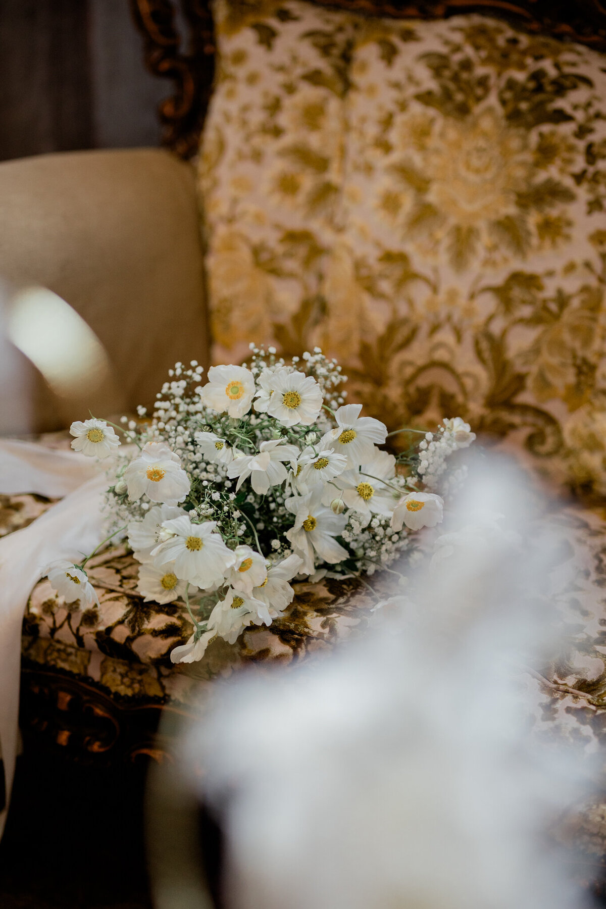 A simple shot of a bouquet on a chair