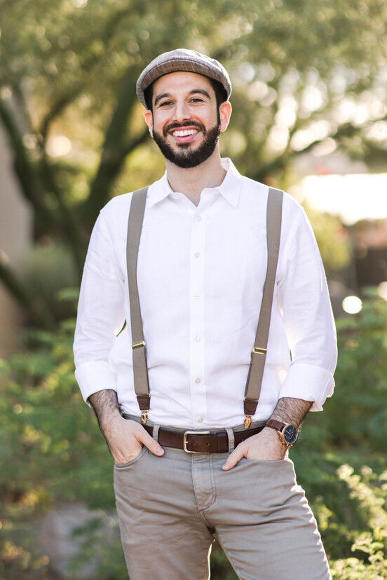 portrait-of-engaged-man-in-suspenders