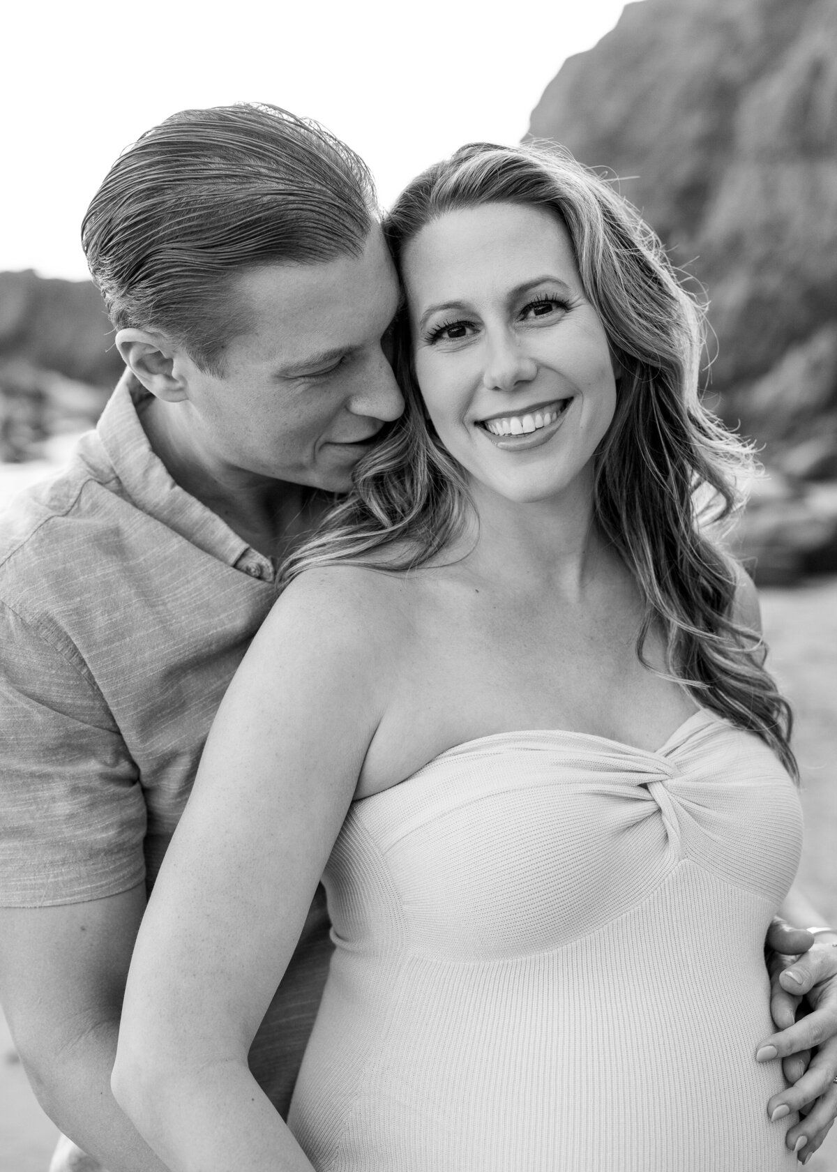 black and white beach maternity photo