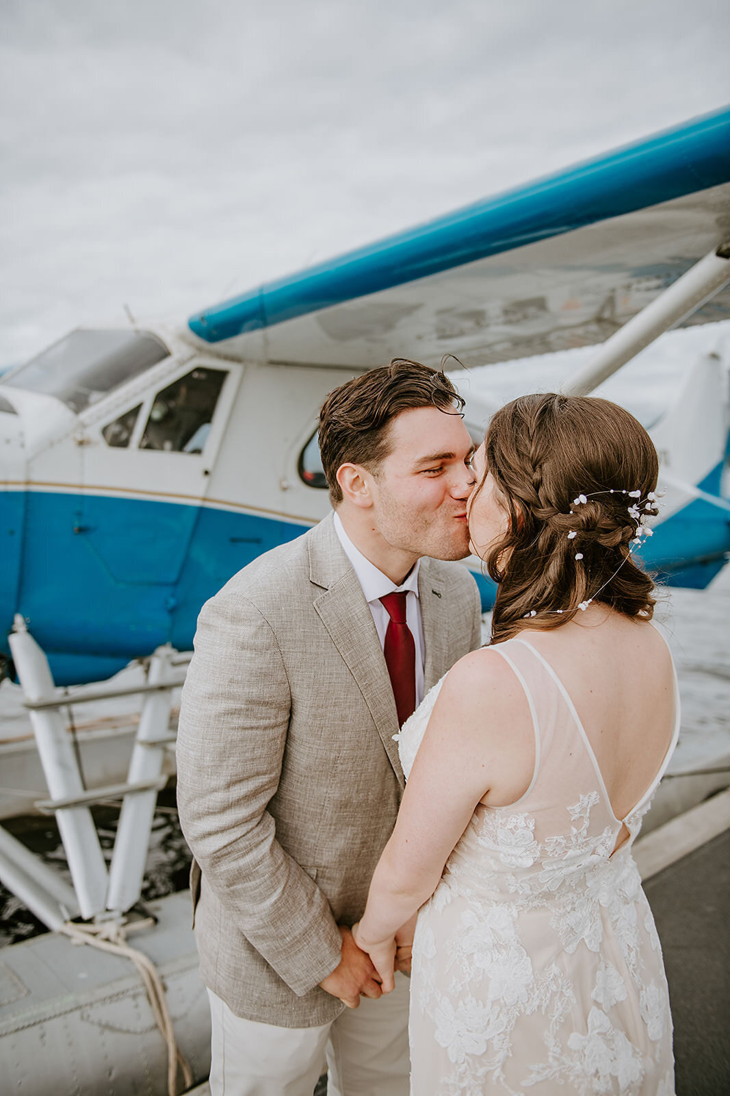 Couple having their first look on the dock awaiting to depart for their Sunshine Coast B.C waterfall elopement
