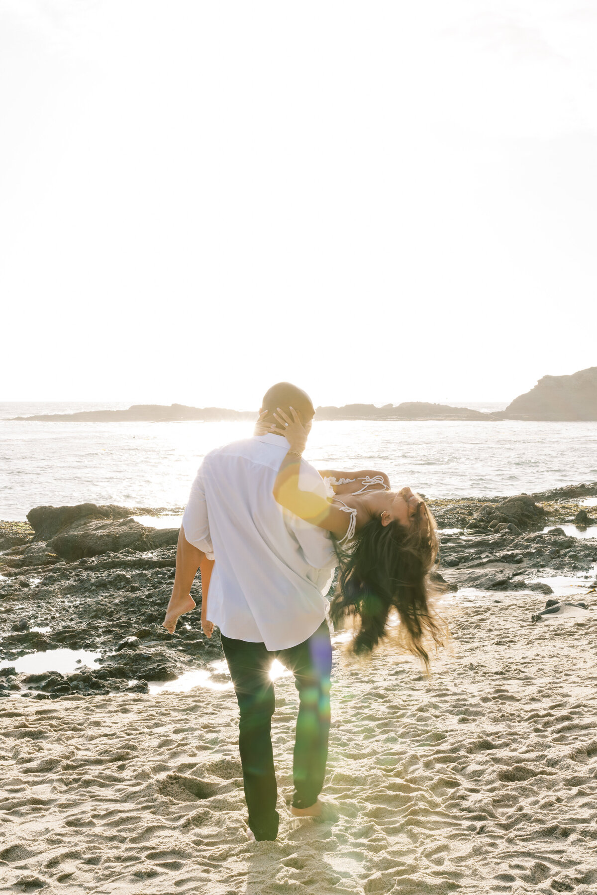 light and bright beach engagement photo