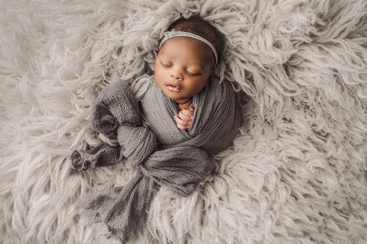 newborn baby girl wrapped in grey , hamilton, ON