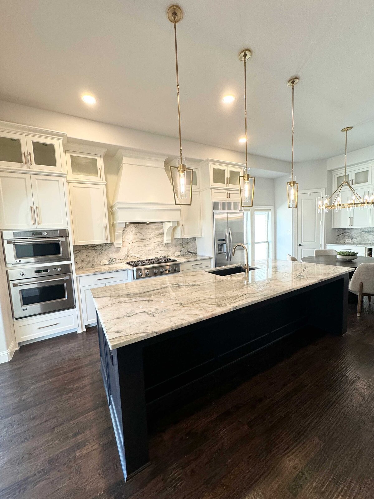 Professional interior design help with a kitchen renovation, showcasing a sleek kitchen with high-quality materials, featuring modern finishes and state-of-the-art design elements.