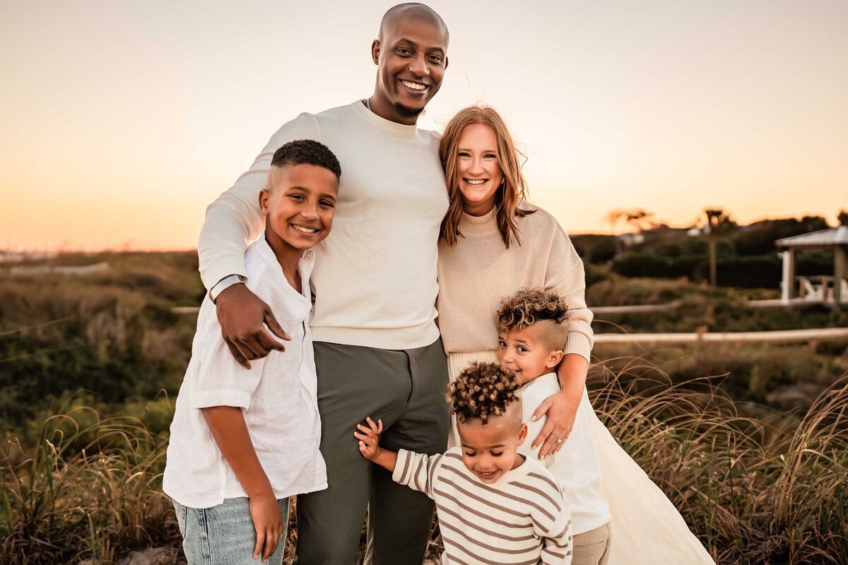 Sunset family photography session in Charleston with parents their three children