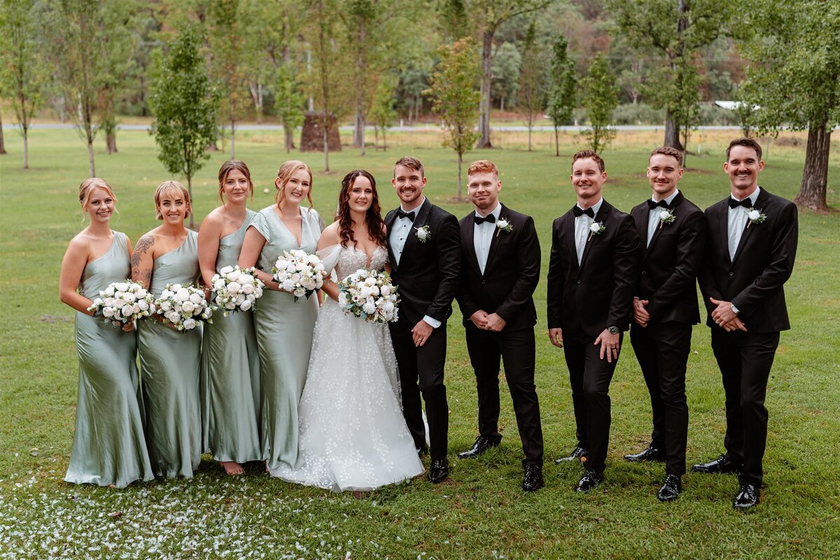 Capture timeless memories with friends in a joyous wedding photoshoot.