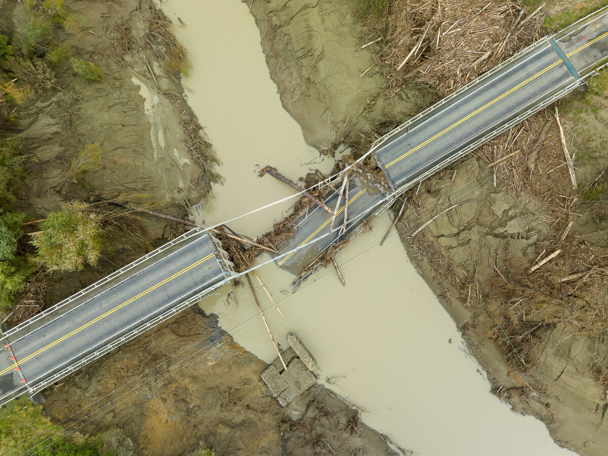 Bridge Collapse SH35. Drone shot showing the river and forestry debris .