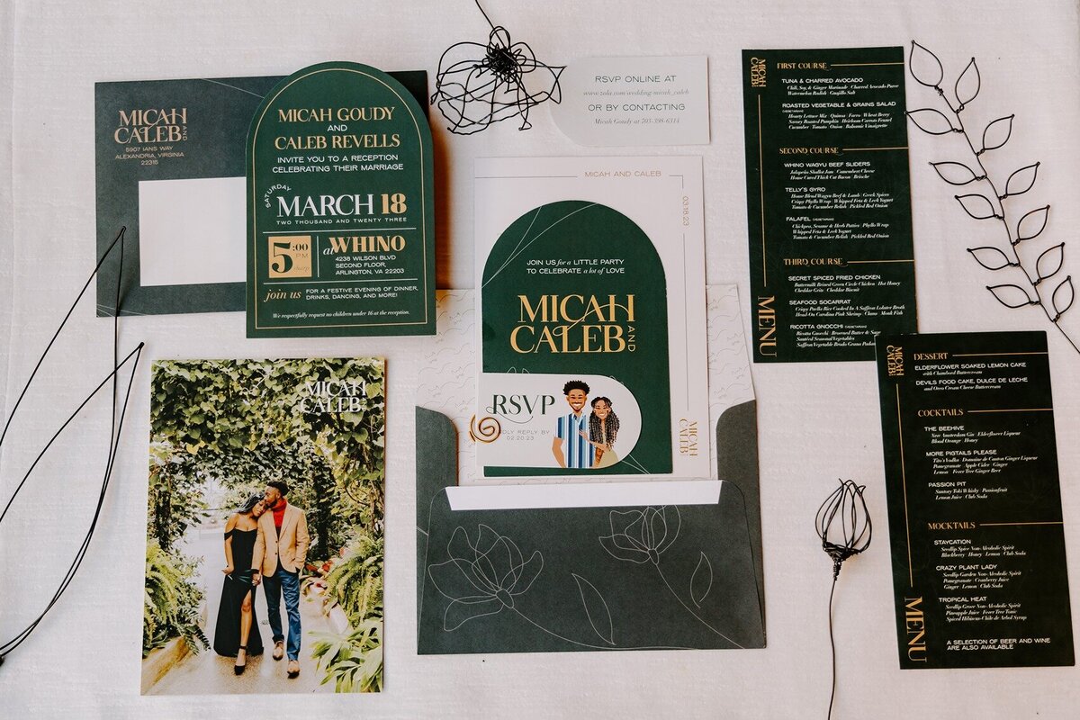 Flat lay of elegant wedding invitations and couples photo