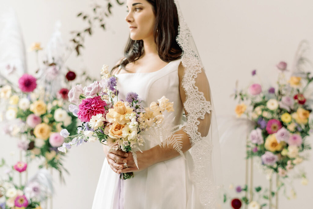 Bright and colourful wedding ceremony decor styled by Melissa Alison Events, a wedding planner based in Calgary, Alberta. Featured on the Brontë Bride Vendor Guide.