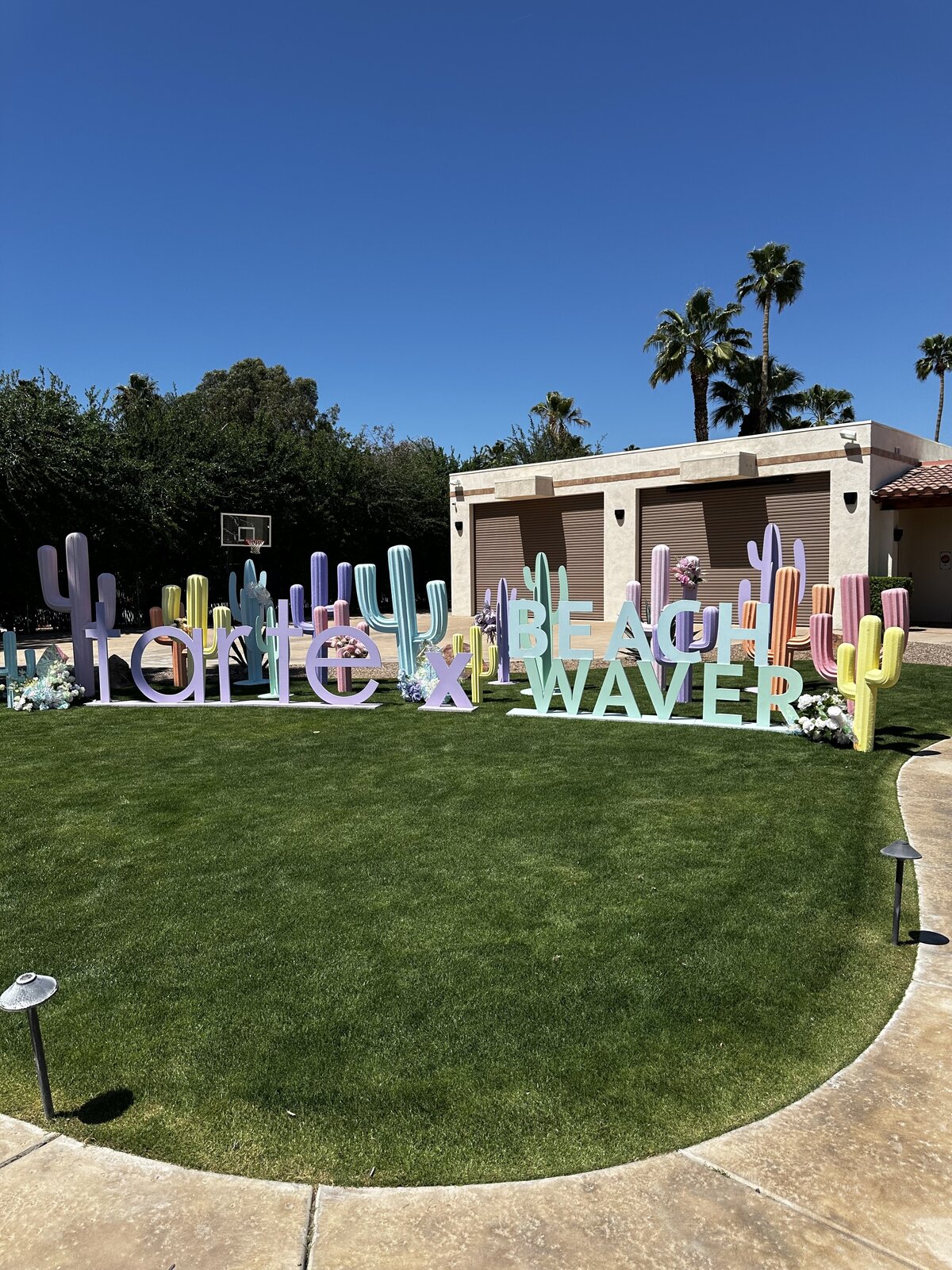 Tarte beauty activation by The Works Collective | custom poolside event installation in Palm Springs, California.
