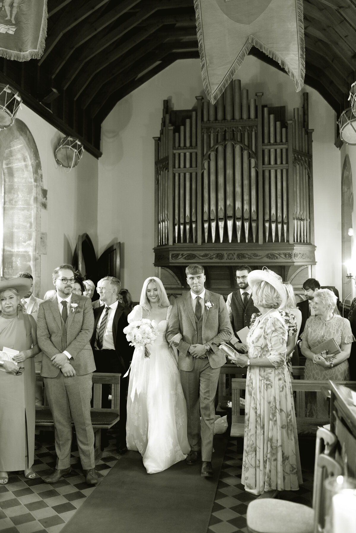 Cromlix House wedding Chapel ceremony, black and white, emotive photography of Bridal entrance in the Chapel interior.