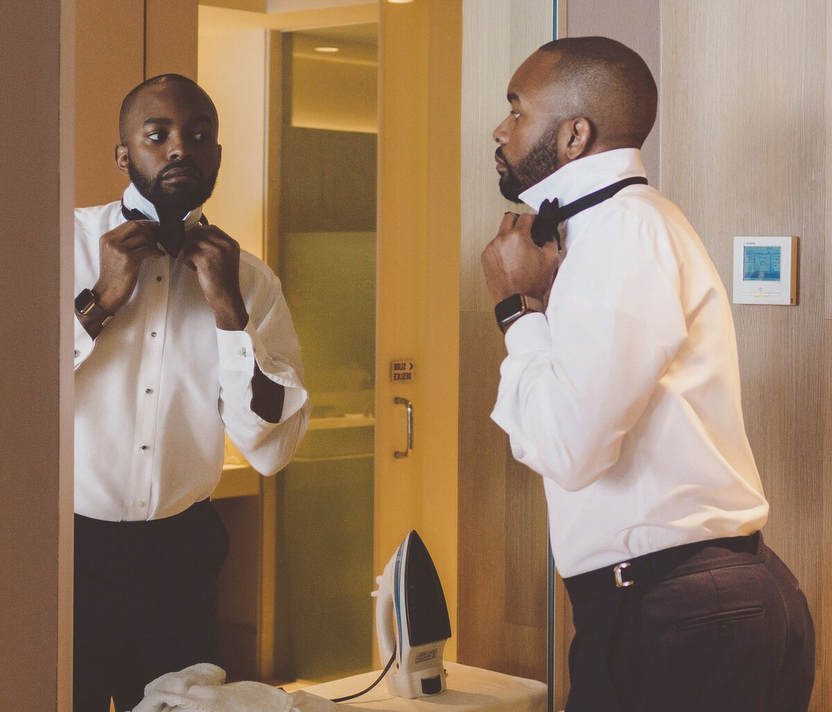 Groom getting ready for Cancun wedding.