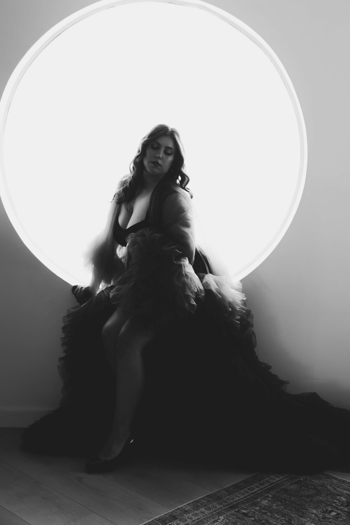 circle window boudoir photo