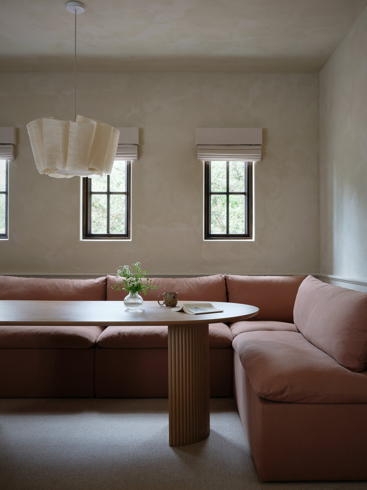 house-franc-hillside-hideaway-movie-theater-kitchenette-laundry-room-remodel-renovation-jamie-sigler-home-limewash-walls-white-oak-table-six-penny-banquette-pinch-london-anders-light-floral-pottery-game-room-moody-interiors-austin-texas
