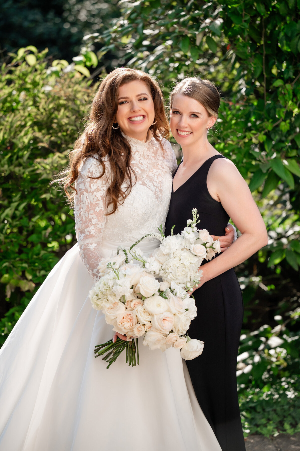 light airy wedding photography of bride and bridesmaid 