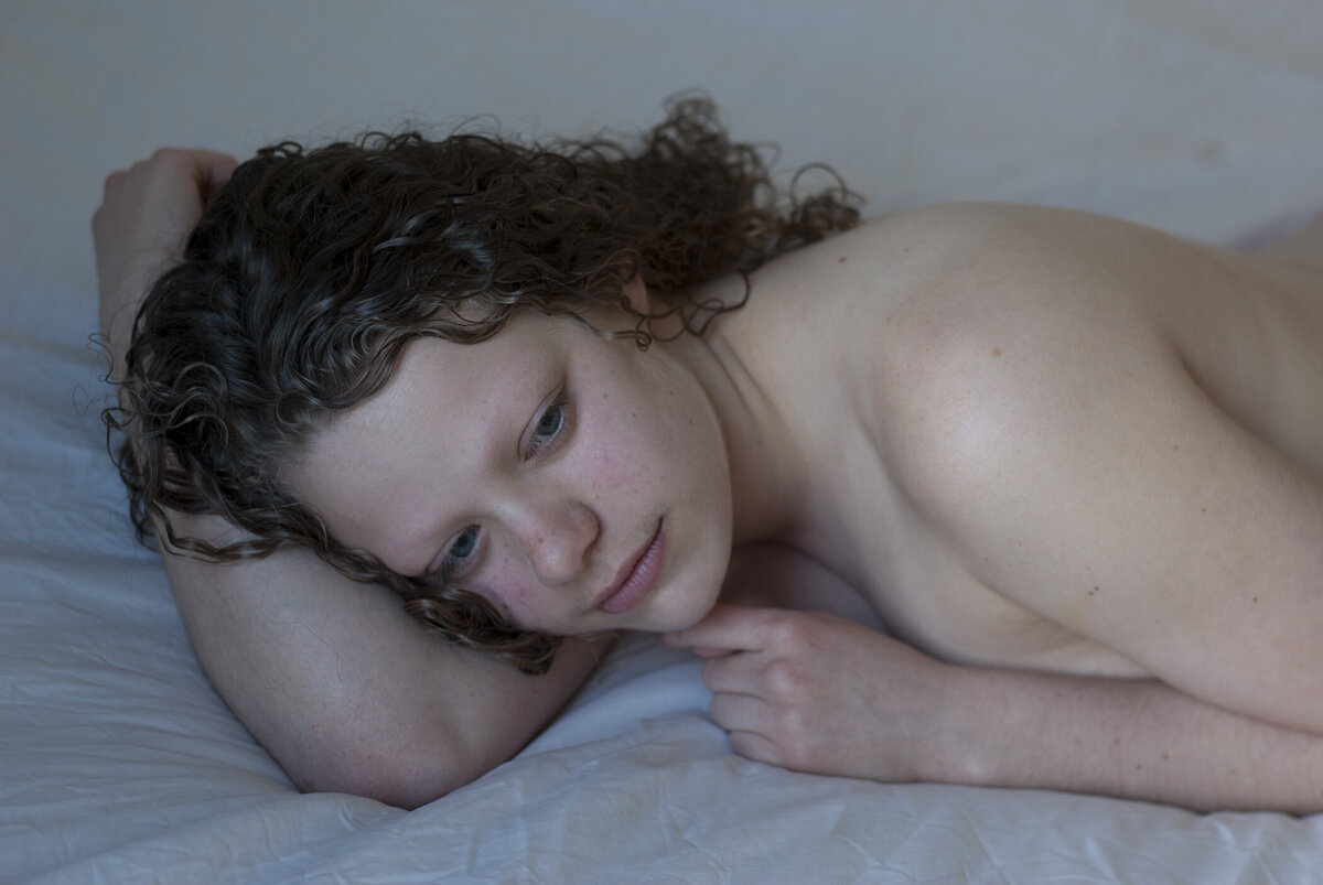 nude portrait on bed