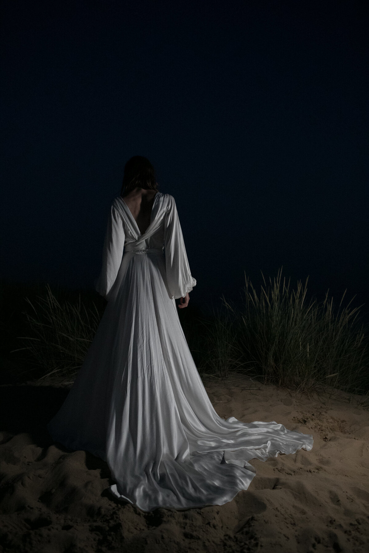 Beach wedding dress in long georgette silk, bride on beach - by british bridal designer Luna Bea