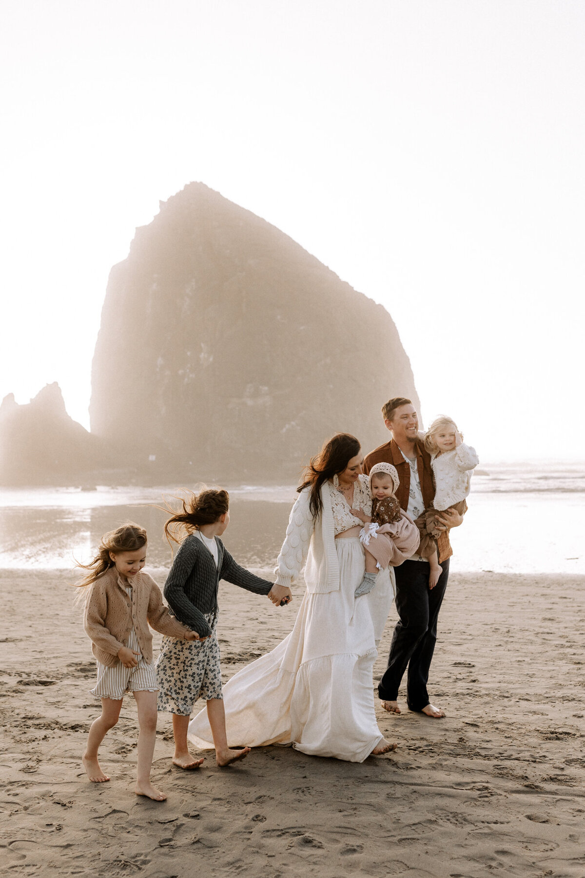 photo taken by Mary Wiebe Photography, a lubbock family photographer. Family strolling the beach