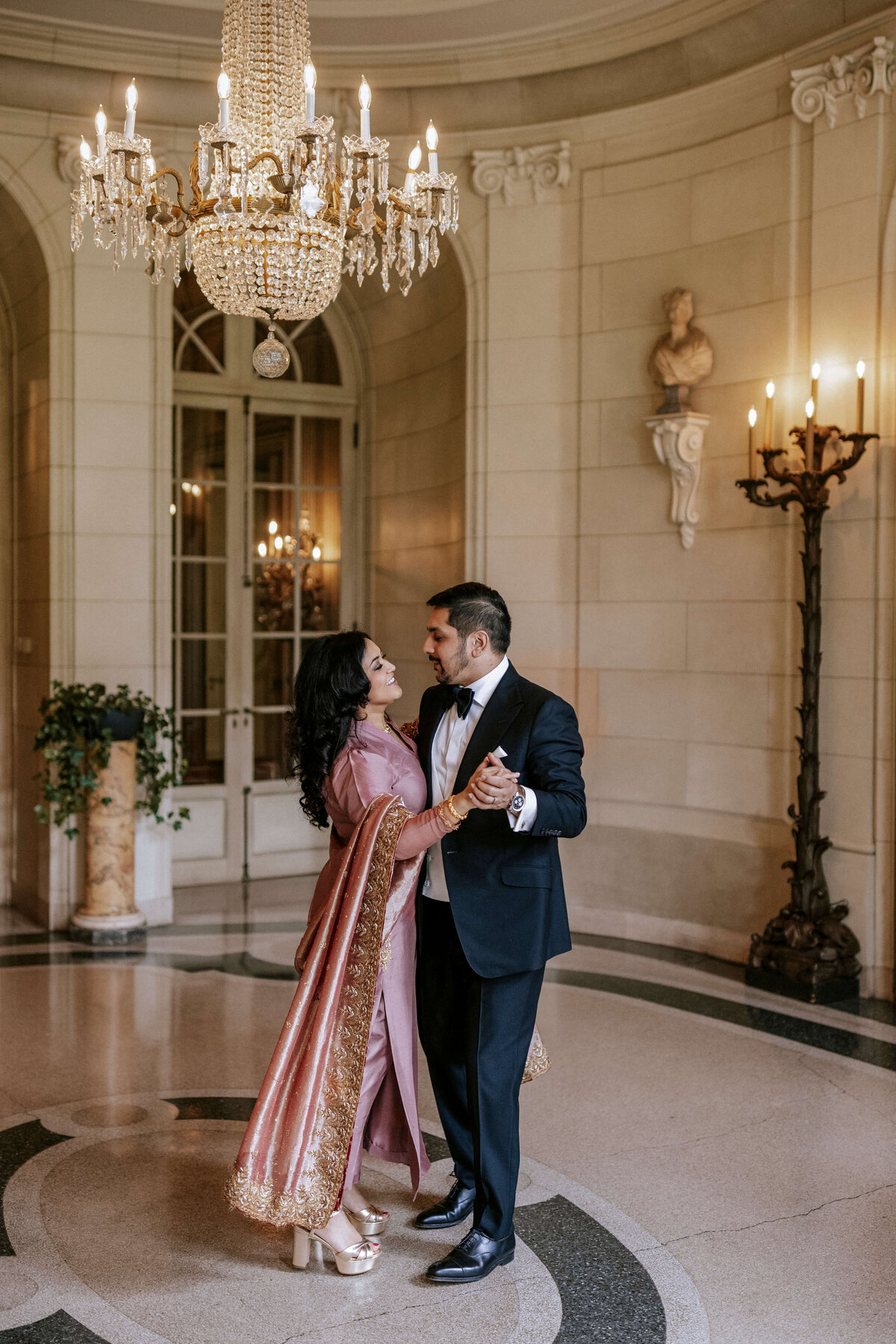 couple-dancing-in-ornate-ballroom