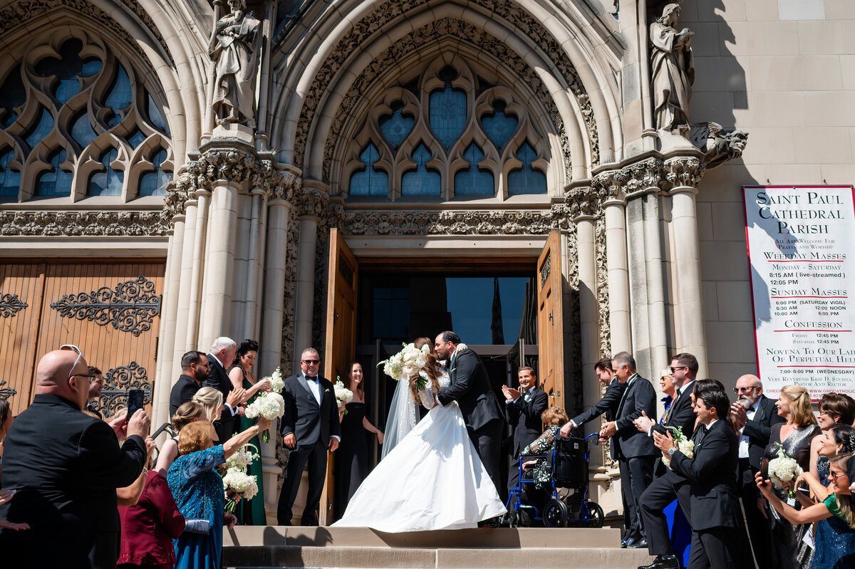 bride and groom exiting wedding ceremony at st paul cathedral pittsburgh
