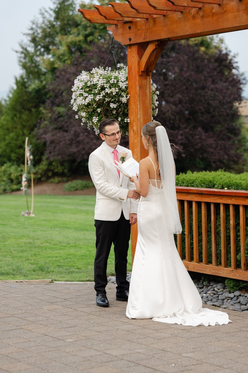 bride and groom exchange private vows at snoqualmie ridge golf course