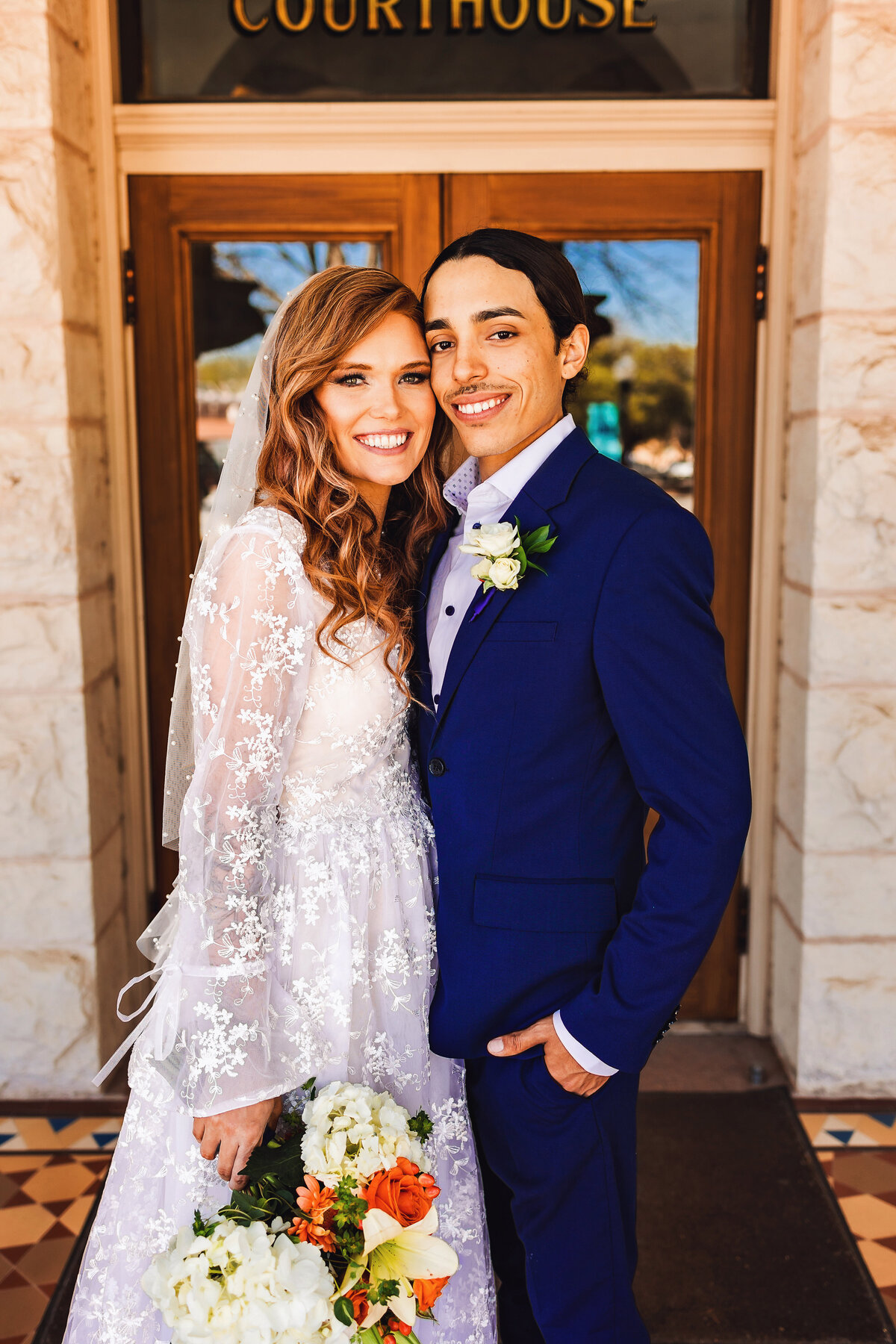 Experience the magic of an intimate courthouse elopement in downtown New Braunfels, Texas. Dive into vibrant colors and create your own adventure, because love knows no bounds.