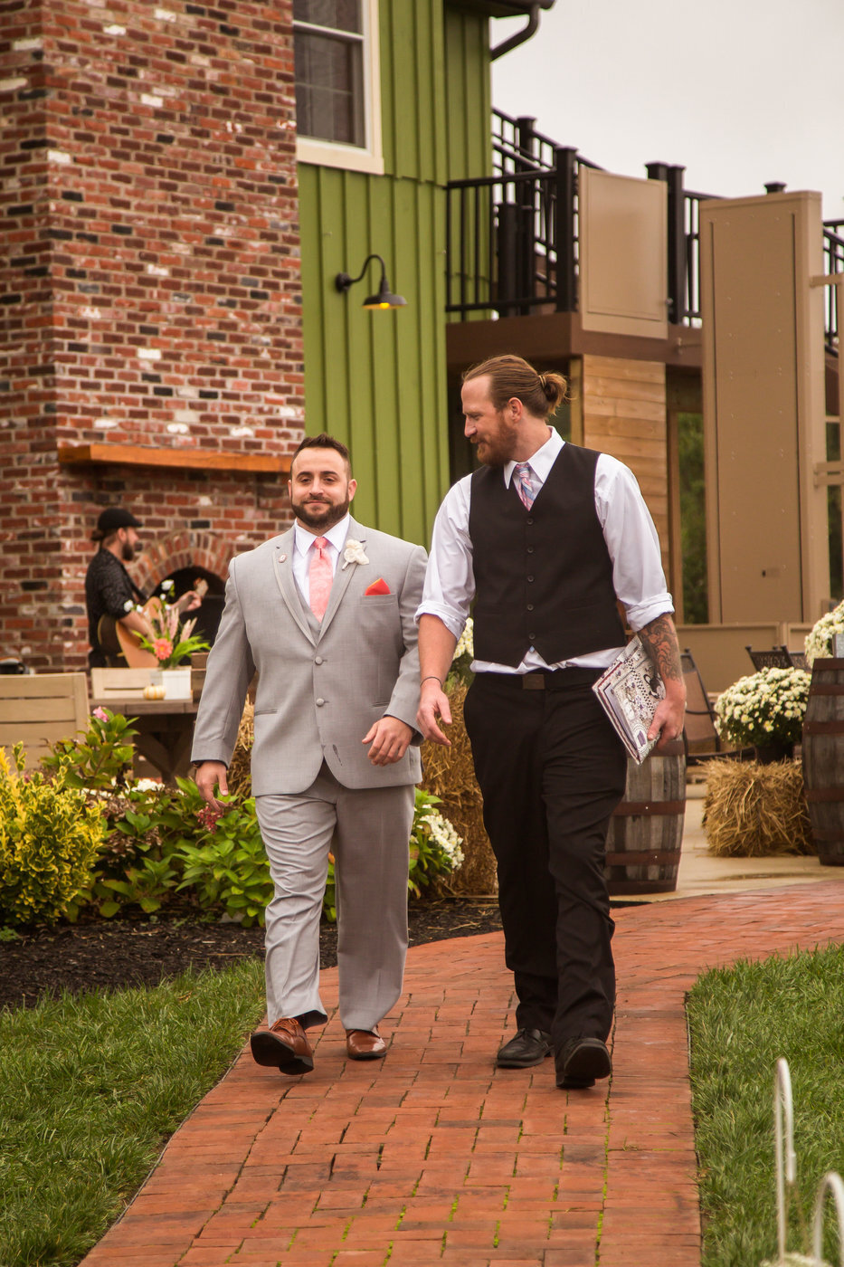 Groom walking down aisle at Thousand Acre Farm in Delaware by Central Florida Wedding Photographer