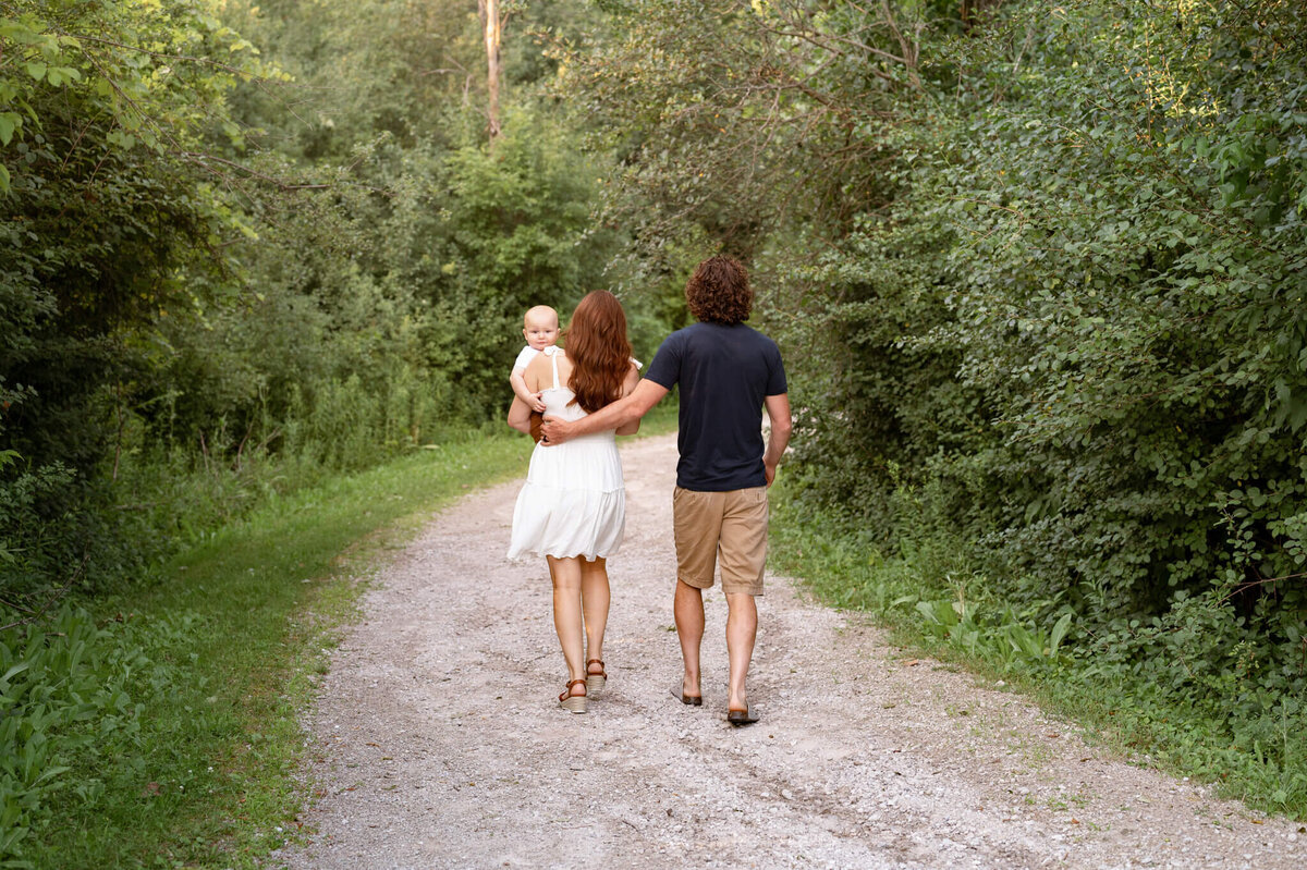 Family walking away from camera at Morton Taylor Trailhead