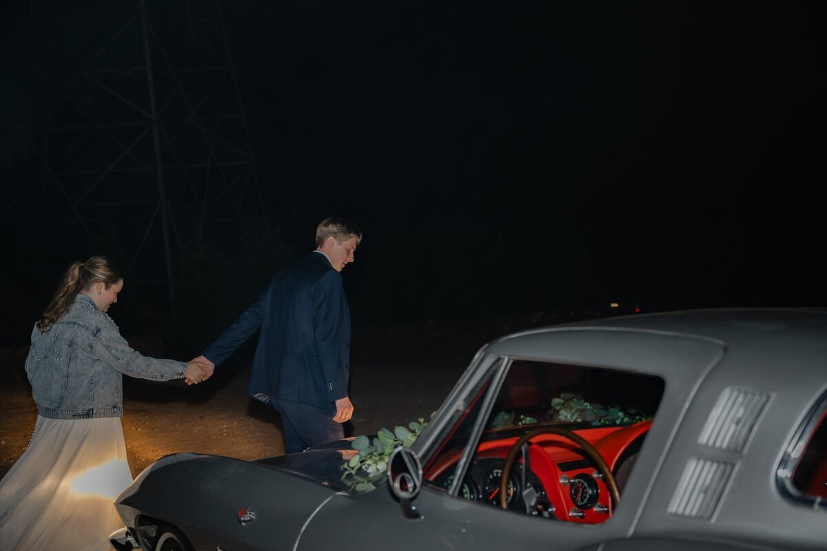 bride and groom departing in antique car from trinity tree farm issaquah wedding venue