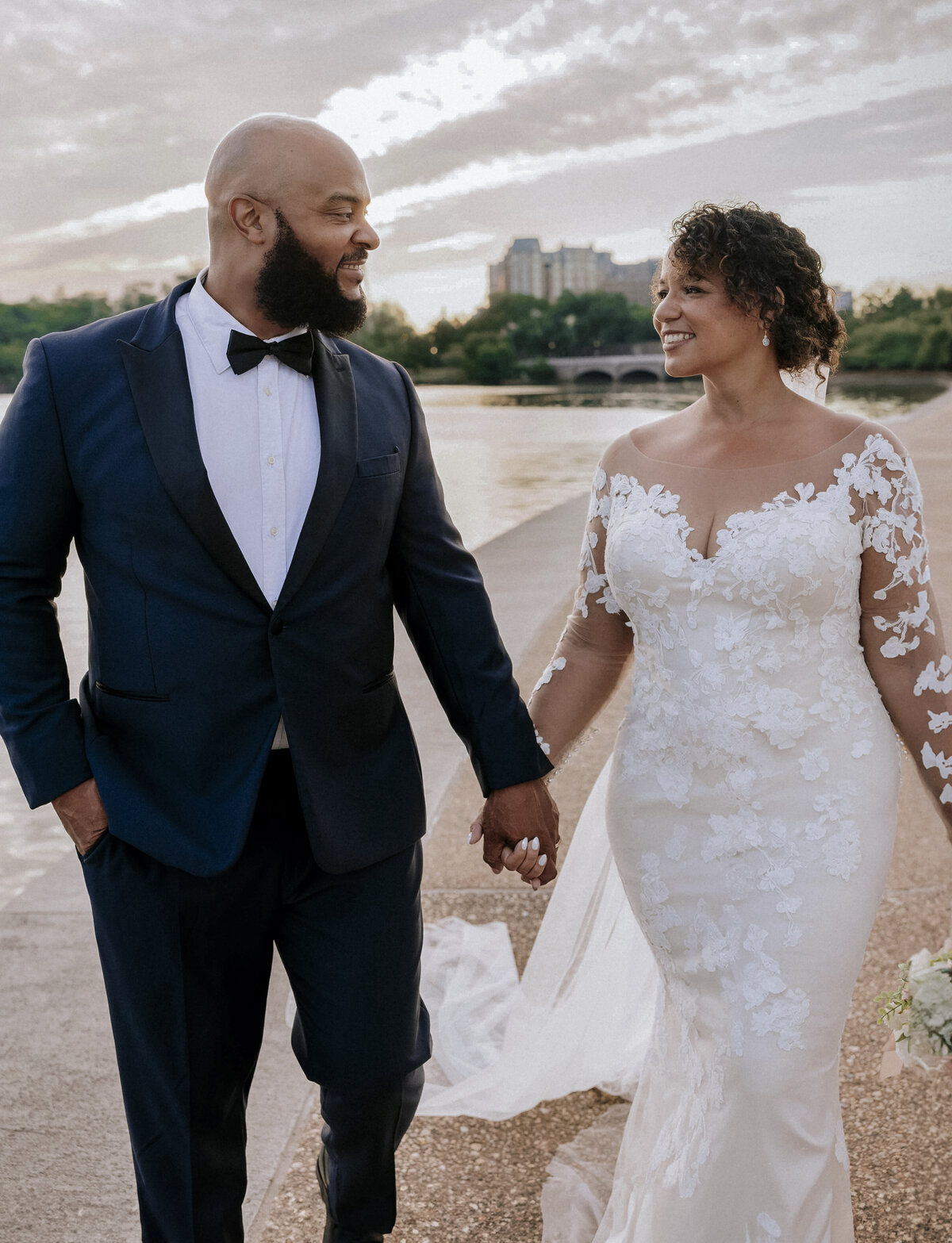 bride-and-groom-walking-by-water