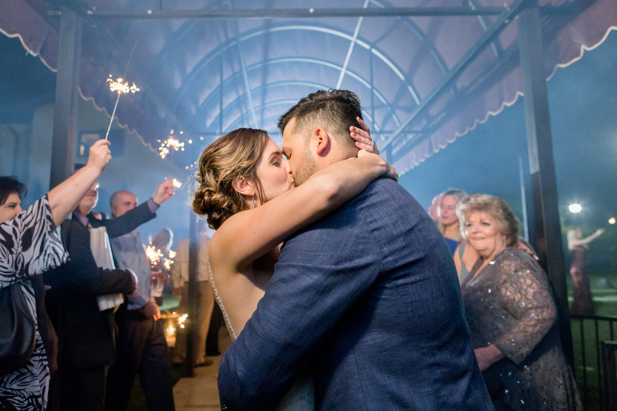sparkler-exit-bride-and-groom-kissing-grand-exit-Monterey-California