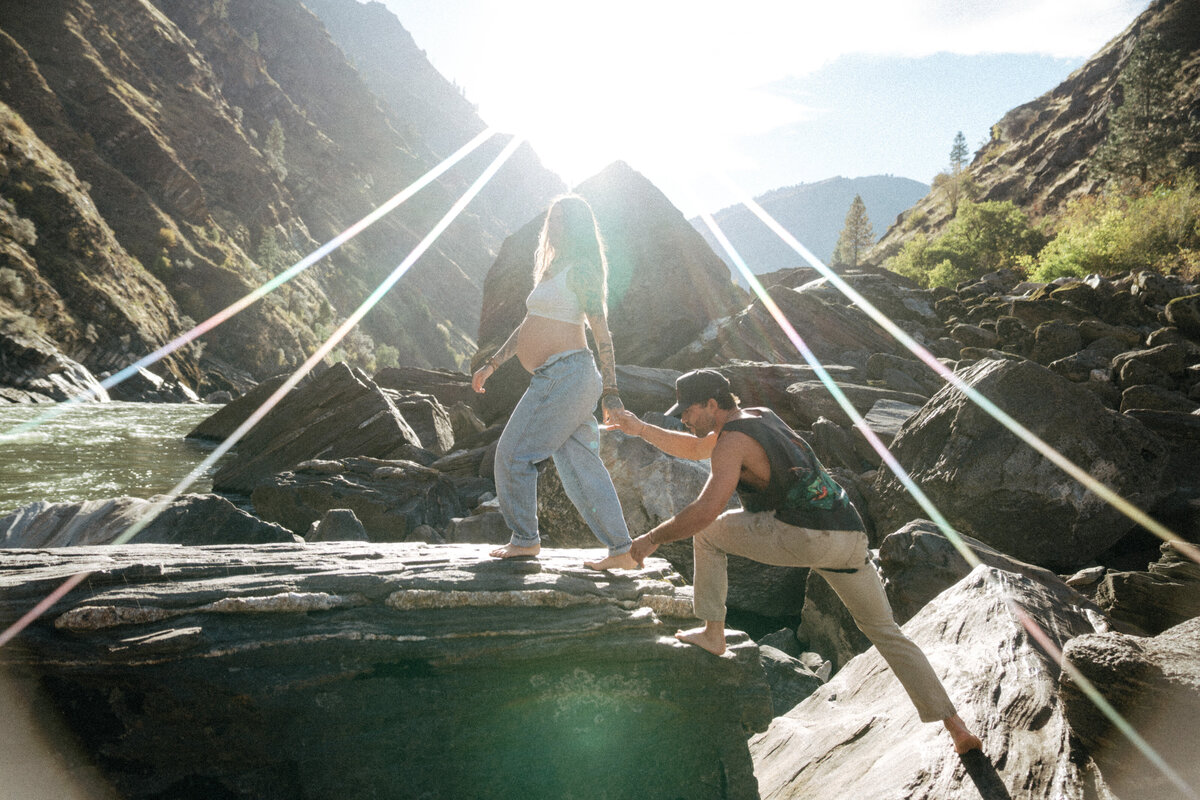 Couple during golden hour engagement and maternity shoot in Riggins, Idaho wedding/elopement - photographed by The Storytellers