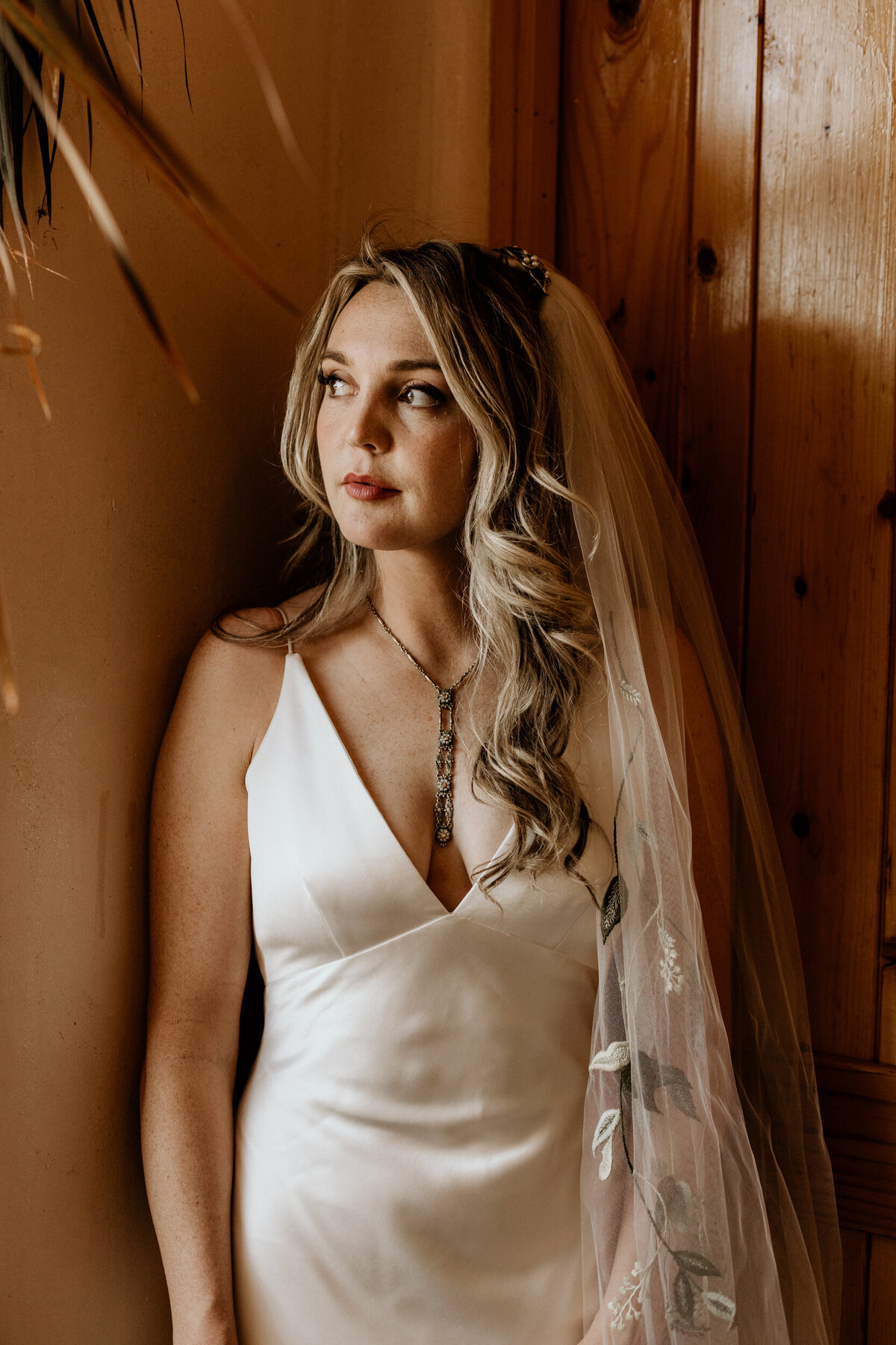 bride standing in a southwestern hall in Santa Fe, New Mexico